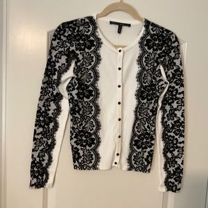 Black and off white snap front sweater